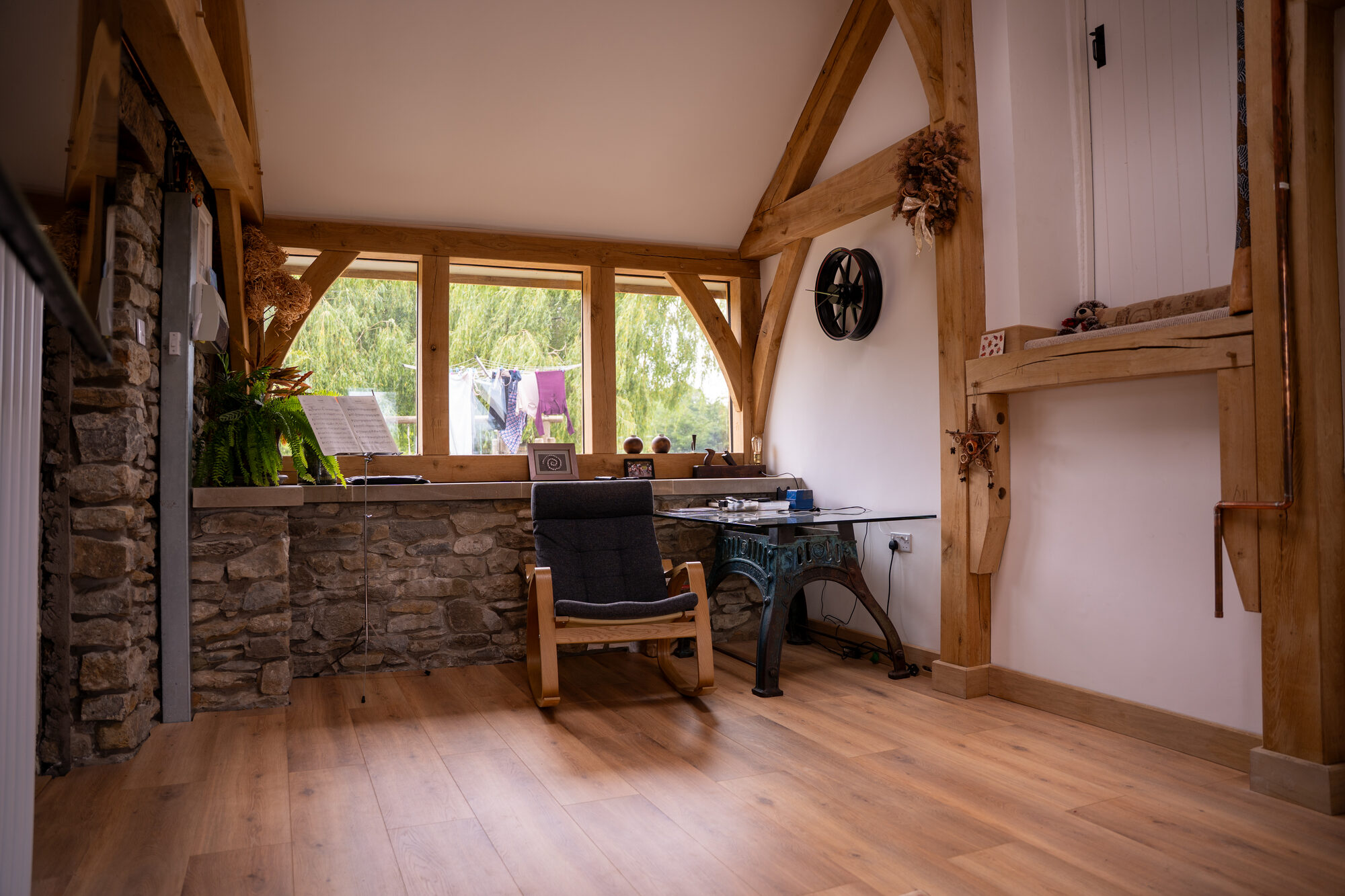 Desk under the glazed elevation of the oak frame link, Usk