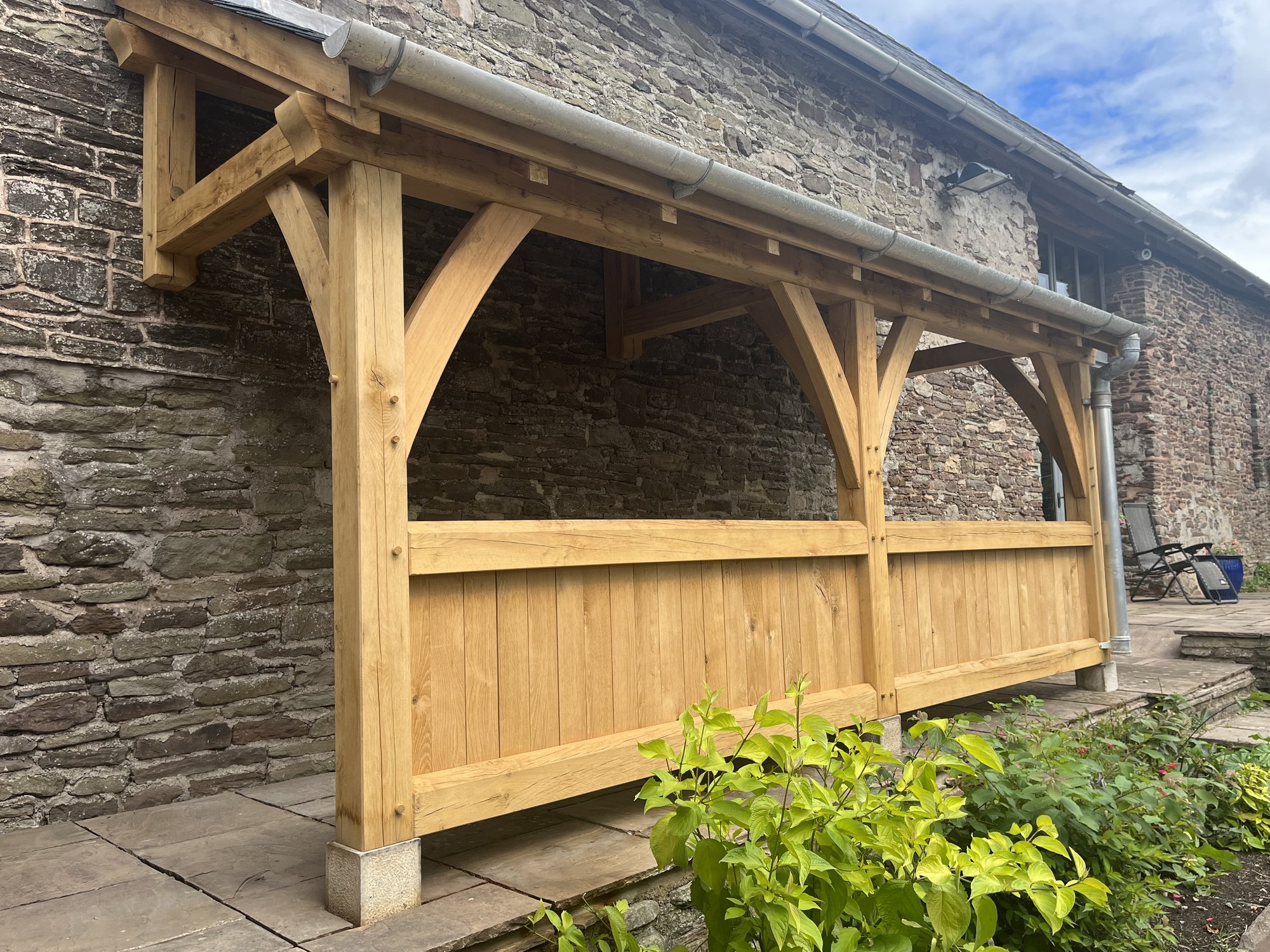 The veranda posts and curved braces from the garden at Llanvetherine.