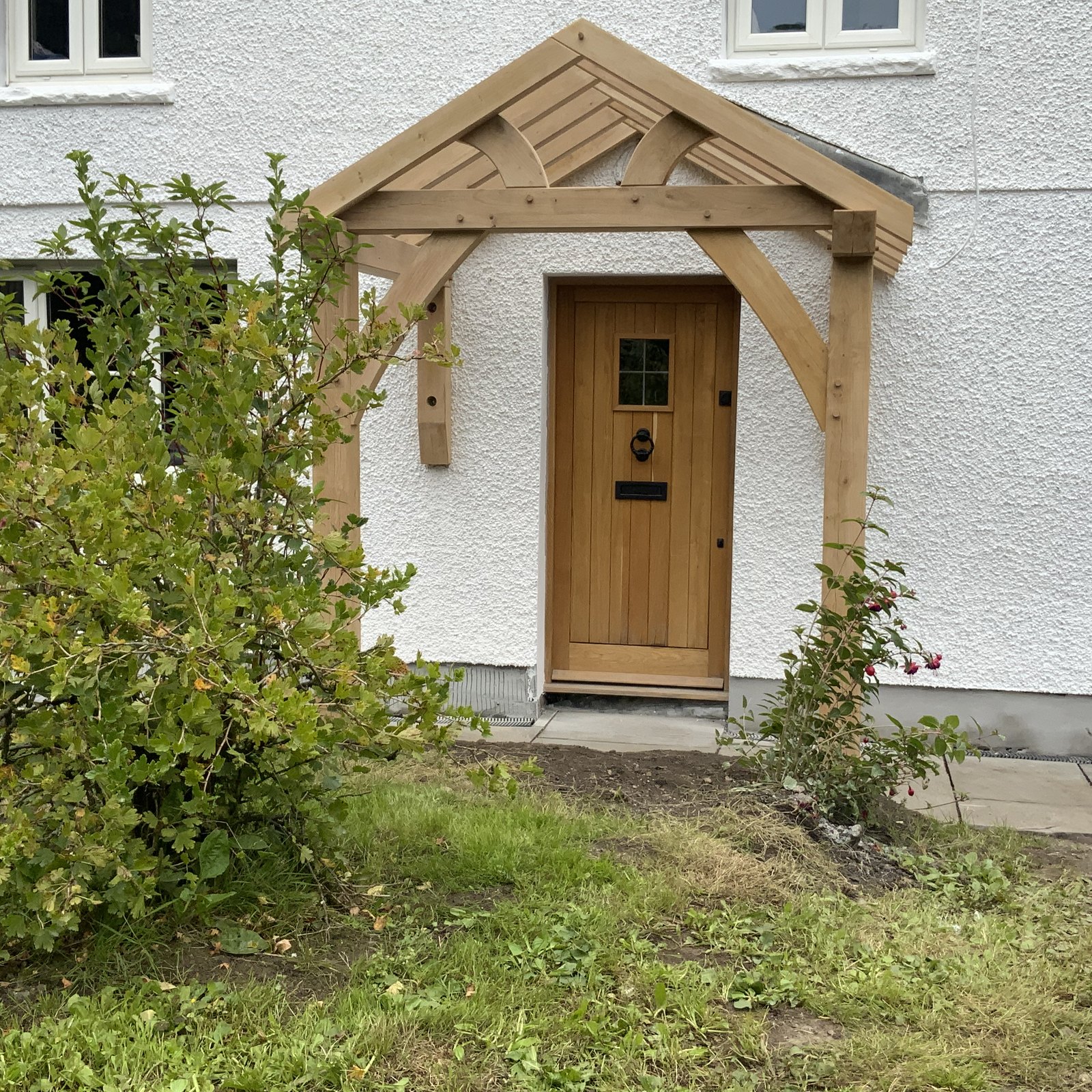Oak gable porch over an oak front door
