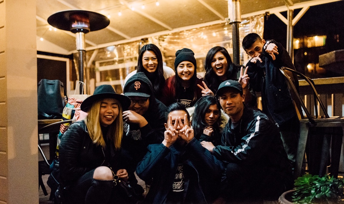 Trysen with friends and guests on the patio at the Aloha Vibes show
