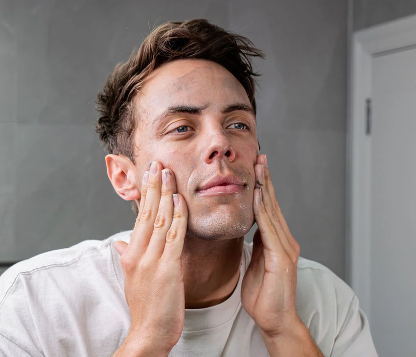 Man washing face.