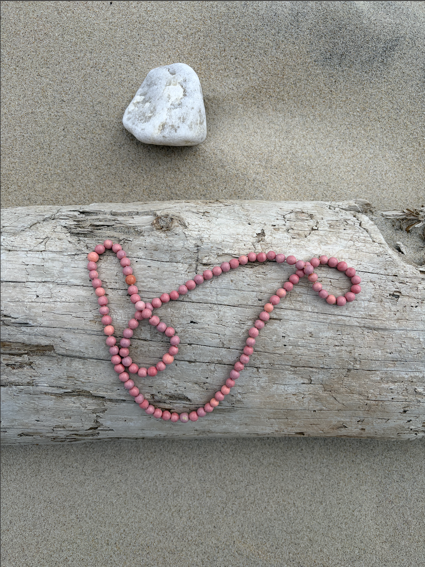 Rosé mala on driftwood 2