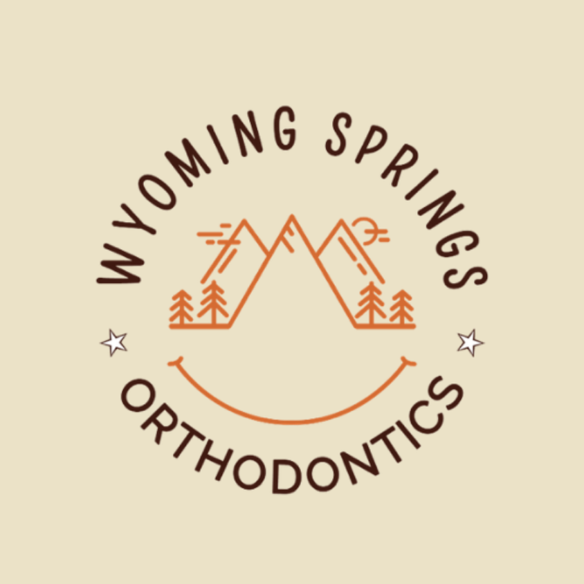 Wyoming Springs Orthodontics logo, a Fern Bluff PTA Bobcat Bash sponsor.