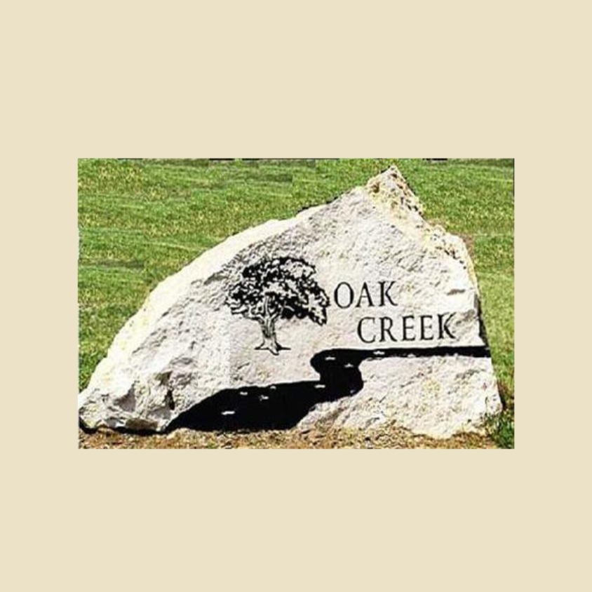 Oak Creek HOA logo, a Fern Bluff PTA Bobcat Bash sponsor.