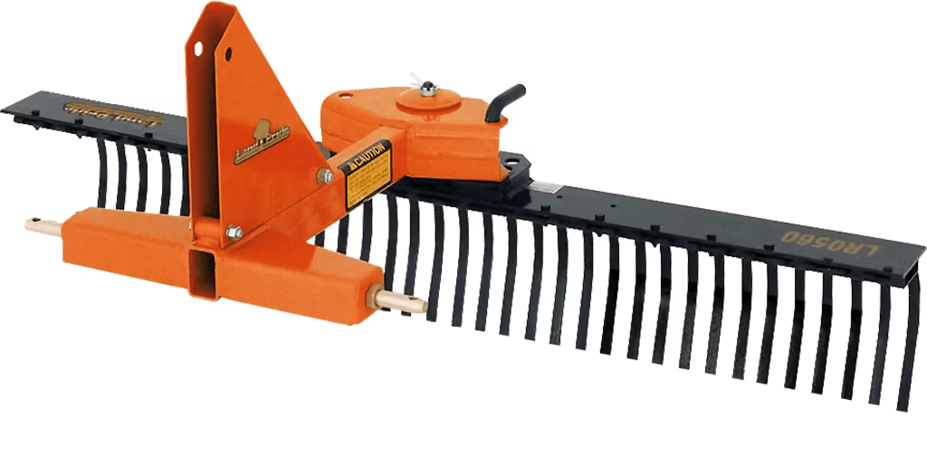 Orange rake attachment with rows of steel tines on a white studio background.