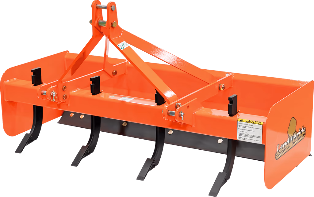Orange grading attachment with wide steel blade on a white studio background.