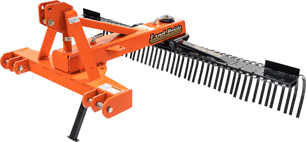 Orange rake attachment with rows of steel tines on a white studio background.