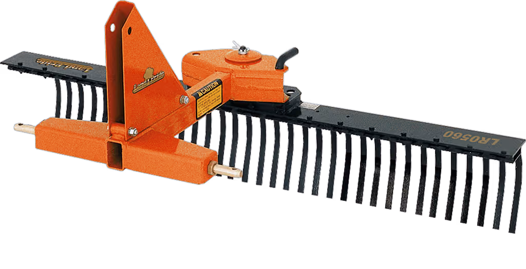 Orange rake attachment with rows of steel tines on a white studio background.