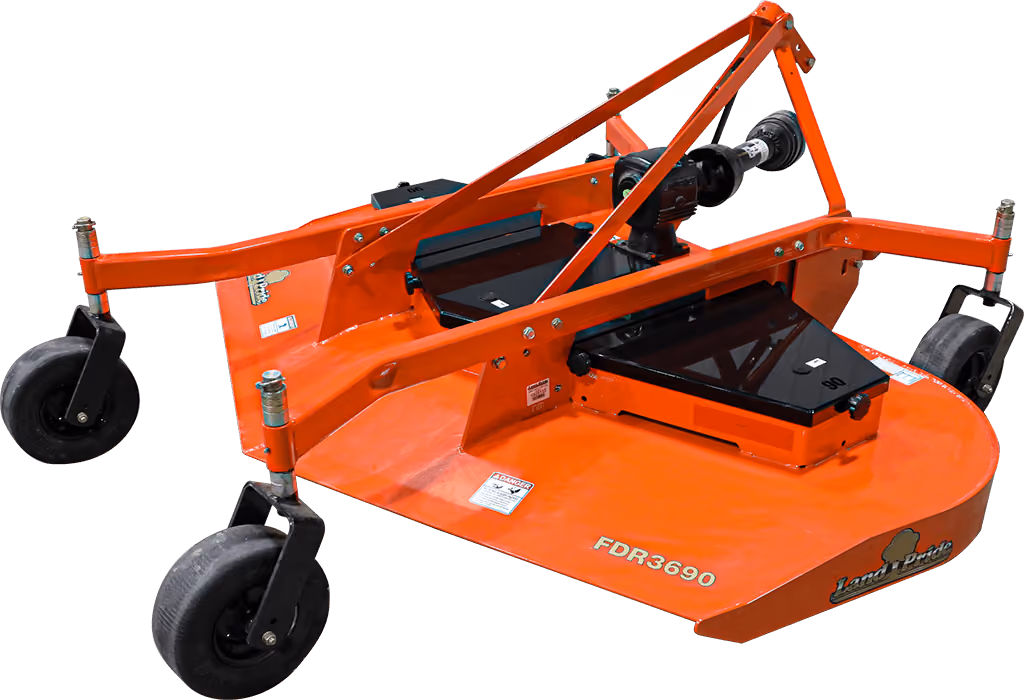 Orange Kubota mower with cutting deck on a white studio background.