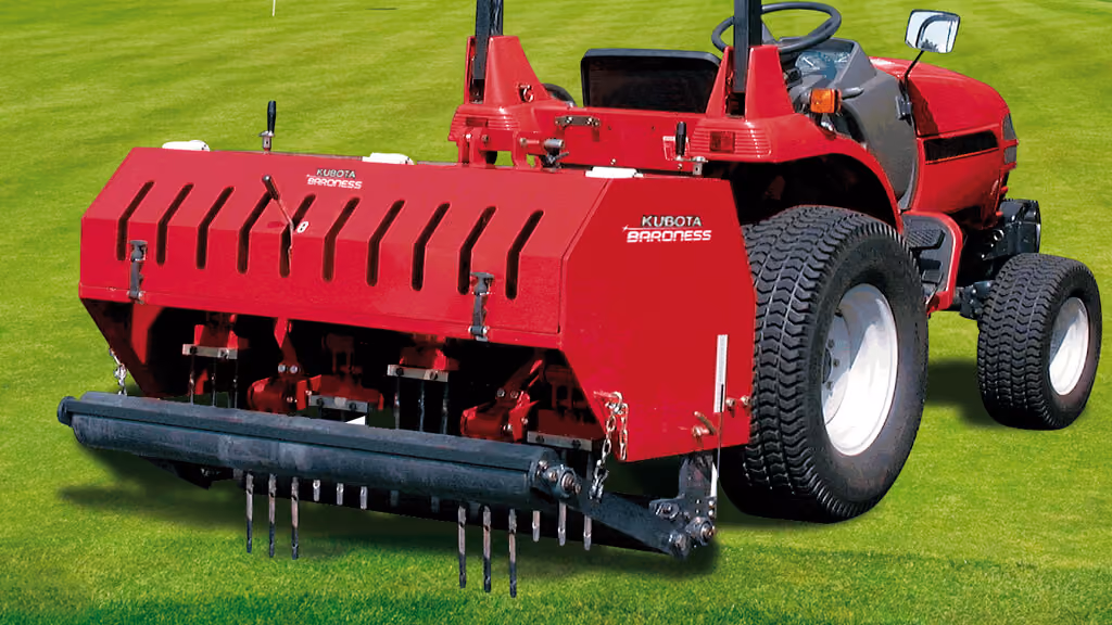 Turf aerator attachment with rows of coring tines.