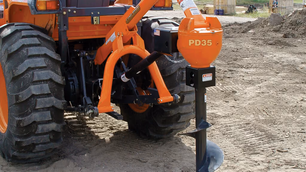 Auger attachment with spiral drill bit.