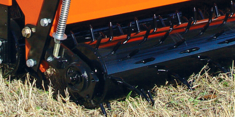 Detail highlighting Optional Rear Spike Roller on All-purpose Seeders APS15 Series.