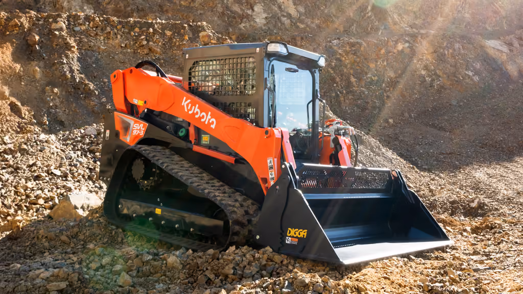 Orange Kubota compact track loader with front bucket.