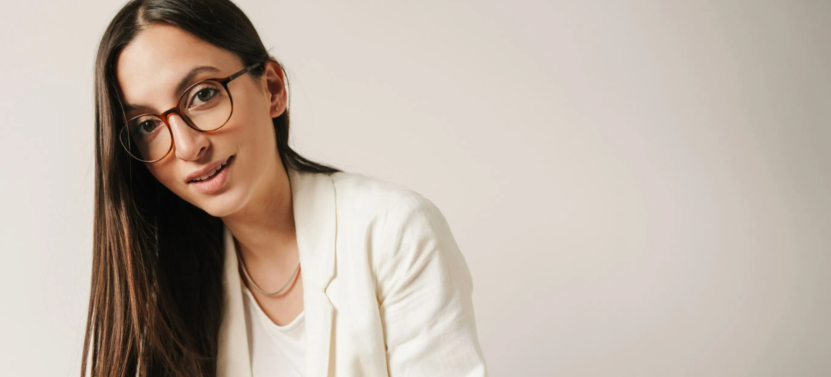 Business women wearing new designer eyewear from Neil Gordon Opticians