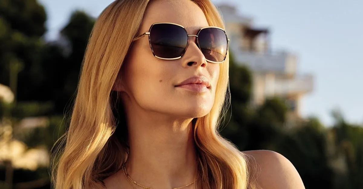 Women wearing prescription sunglasses at Neil Gordon Opticians