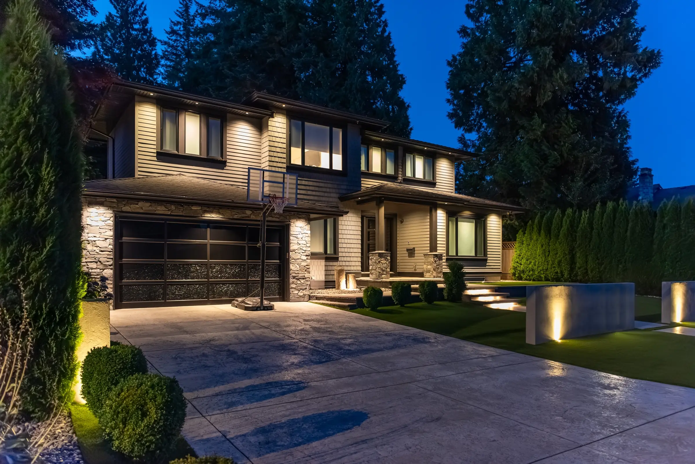 Modern detached house in the GTA at dusk, professionally managed by CentreKey