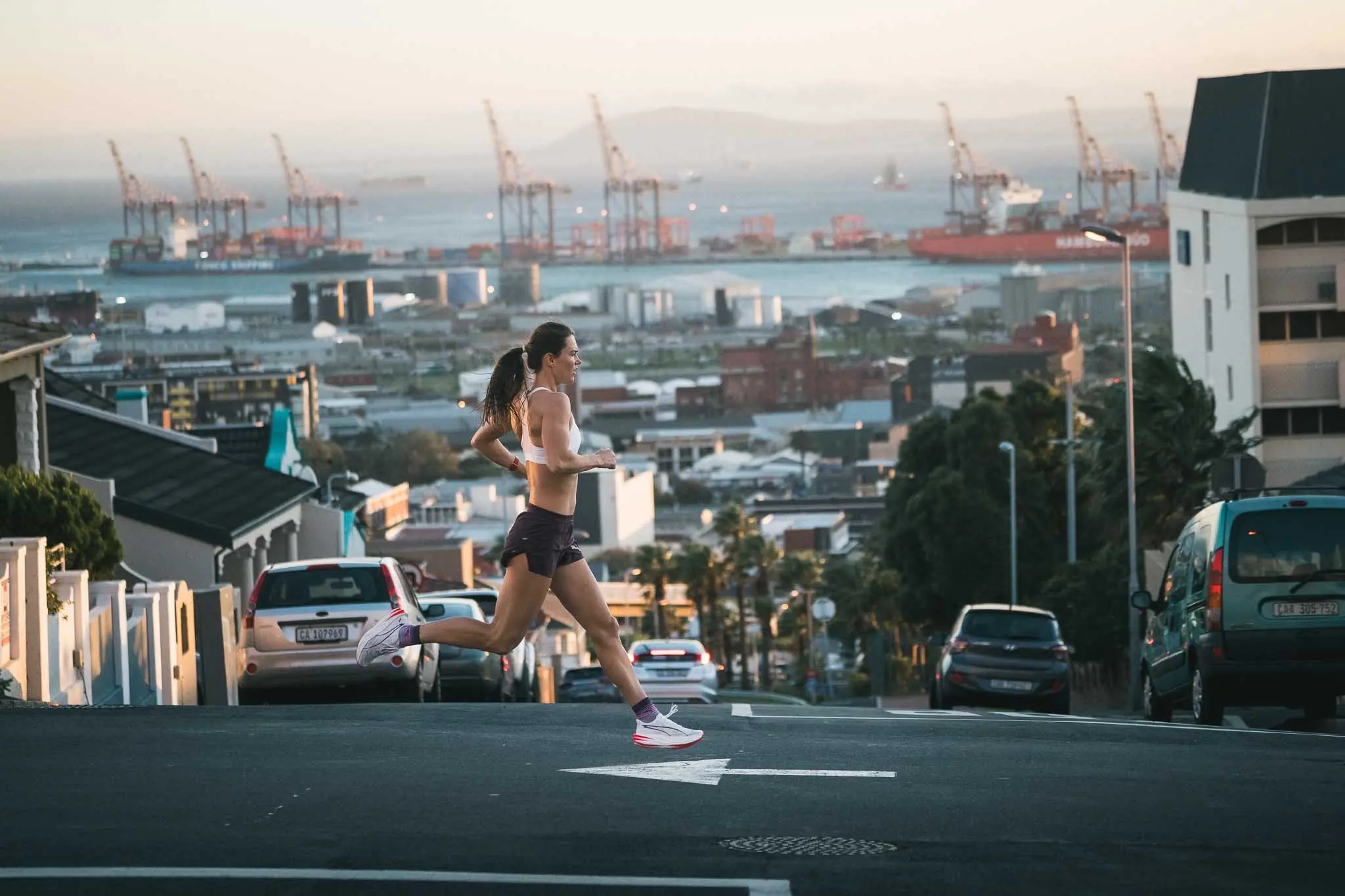 Running photographer Cape Town — Micaela running the city streets