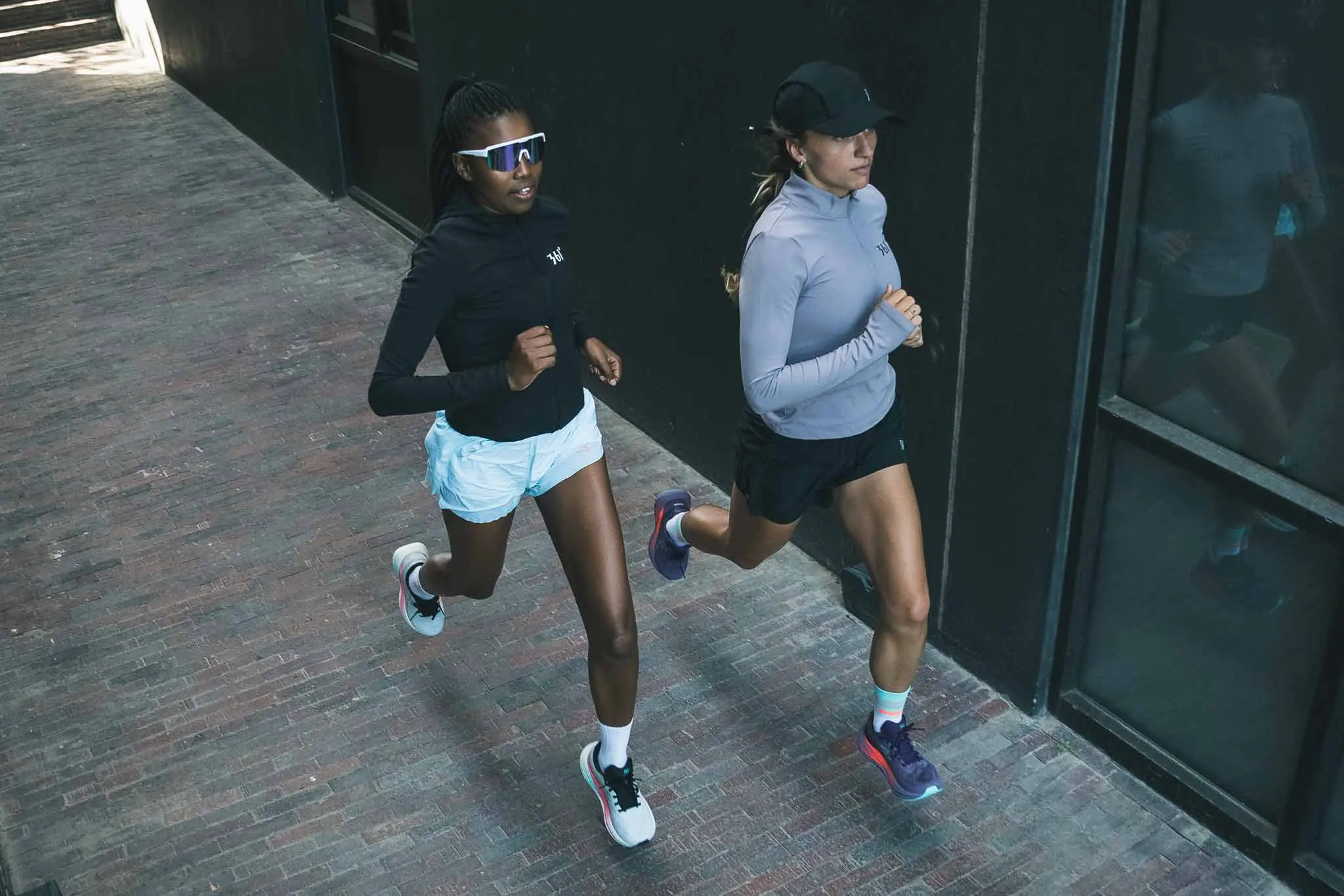Running photographer Cape Town — 361° athletes running a brick walkway. high angle