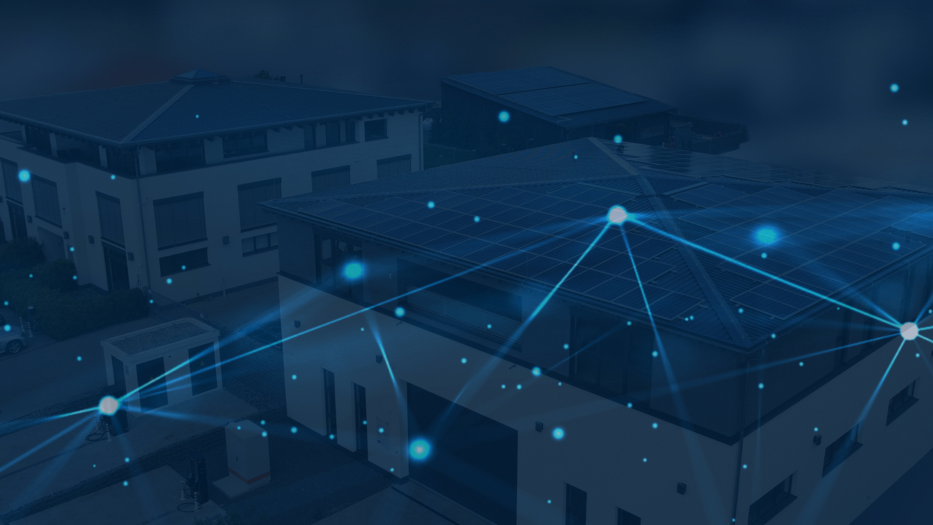 Firmengebäude der Pfeffer GmbH mit Solardächern und digitaler Netzwerk-Visualisierung als Symbol für intelligente Energienetze