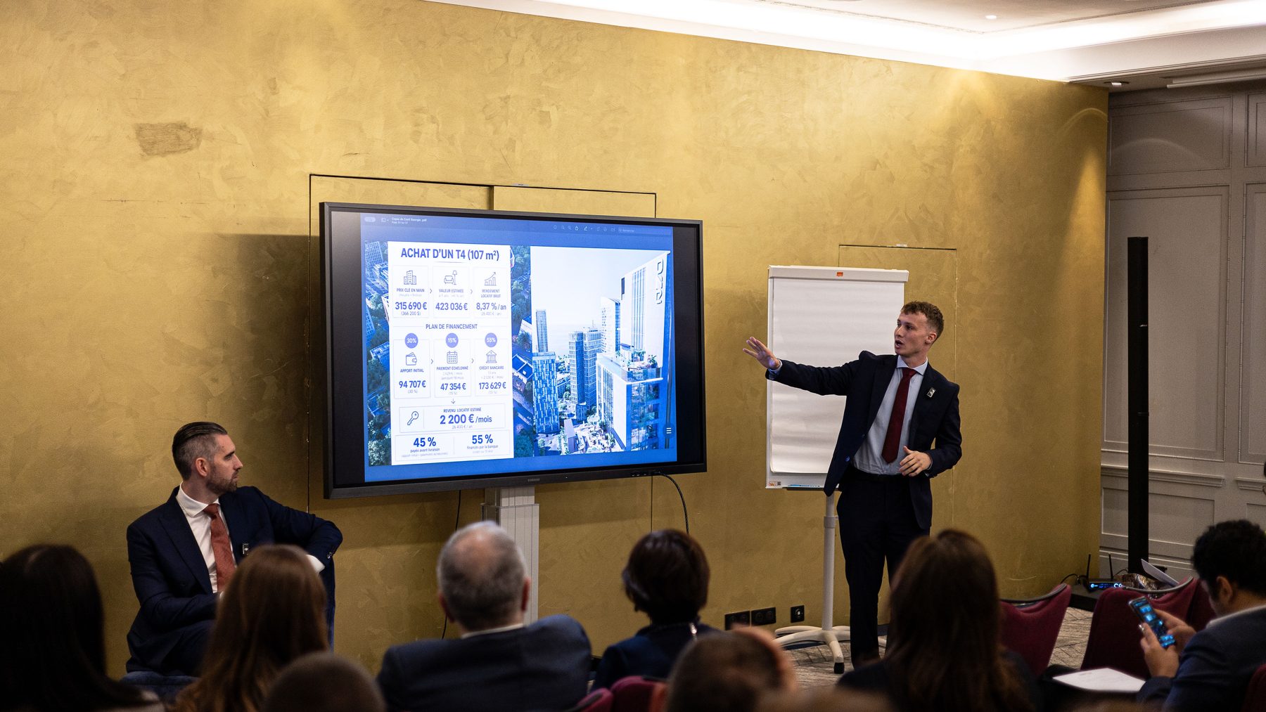 Adrien Boucher presenting Georgian real estate projects to the audience in Paris
