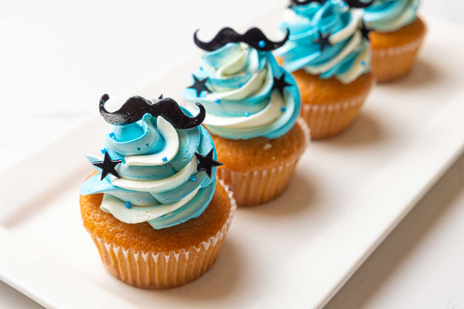 Decorated vanilla cupcakes from Corner Cafe in Nadi