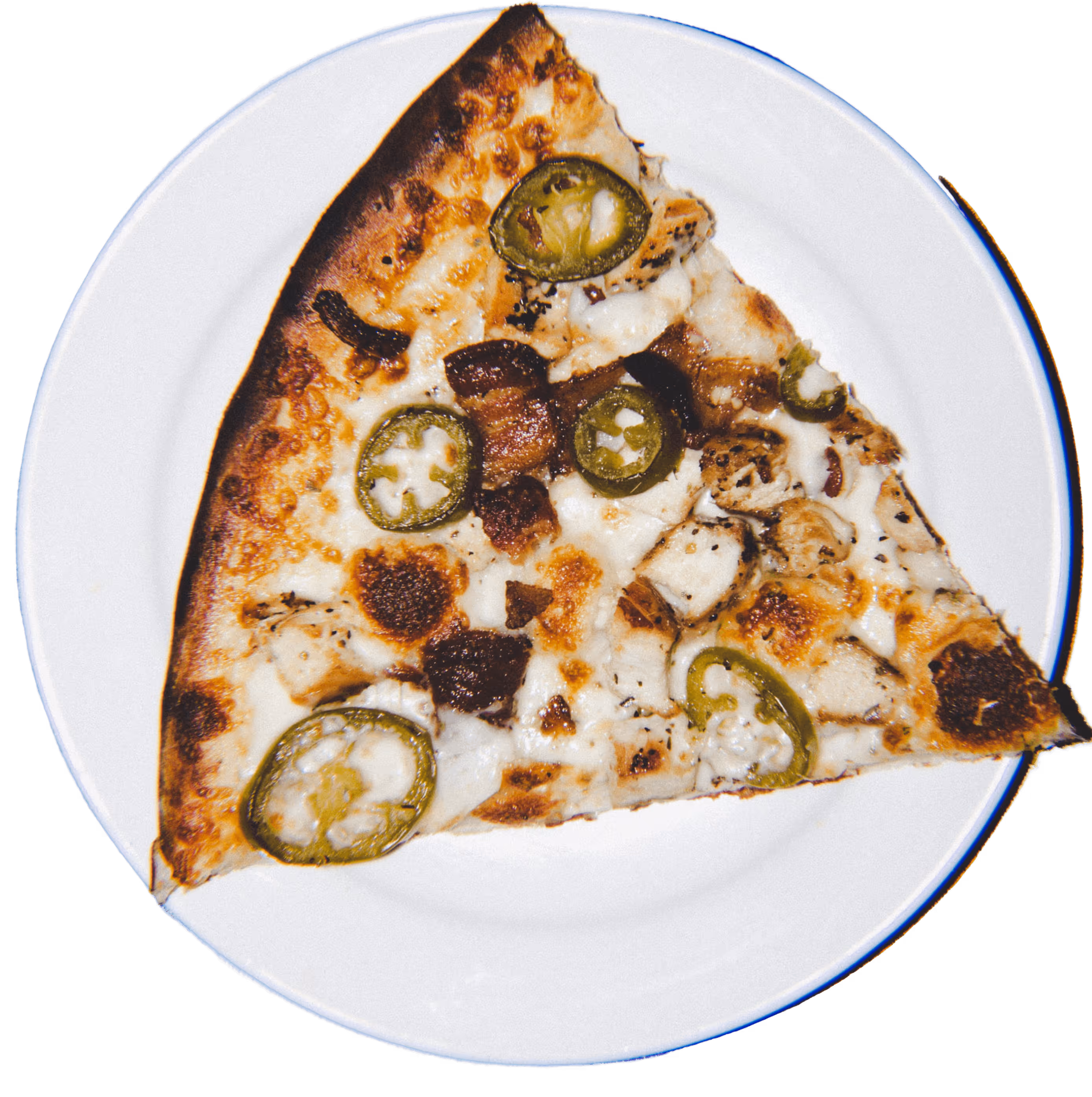 Slice of pizza with jalapeños, chicken, bacon, and melted cheese on a white plate.