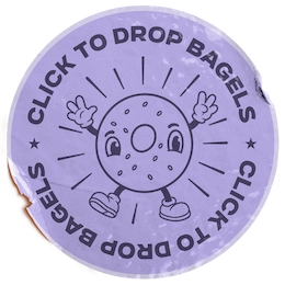 Purple sticker with a cartoon bagel and text “CLICK TO DROP BAGELS” around the edge.