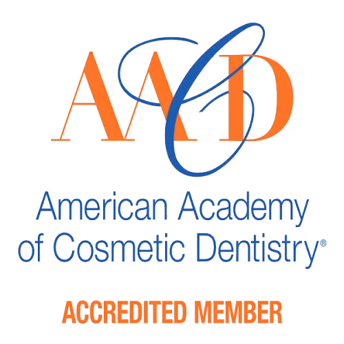 American Academy of Cosmetic Dentistry logo with Accredited Member text below.