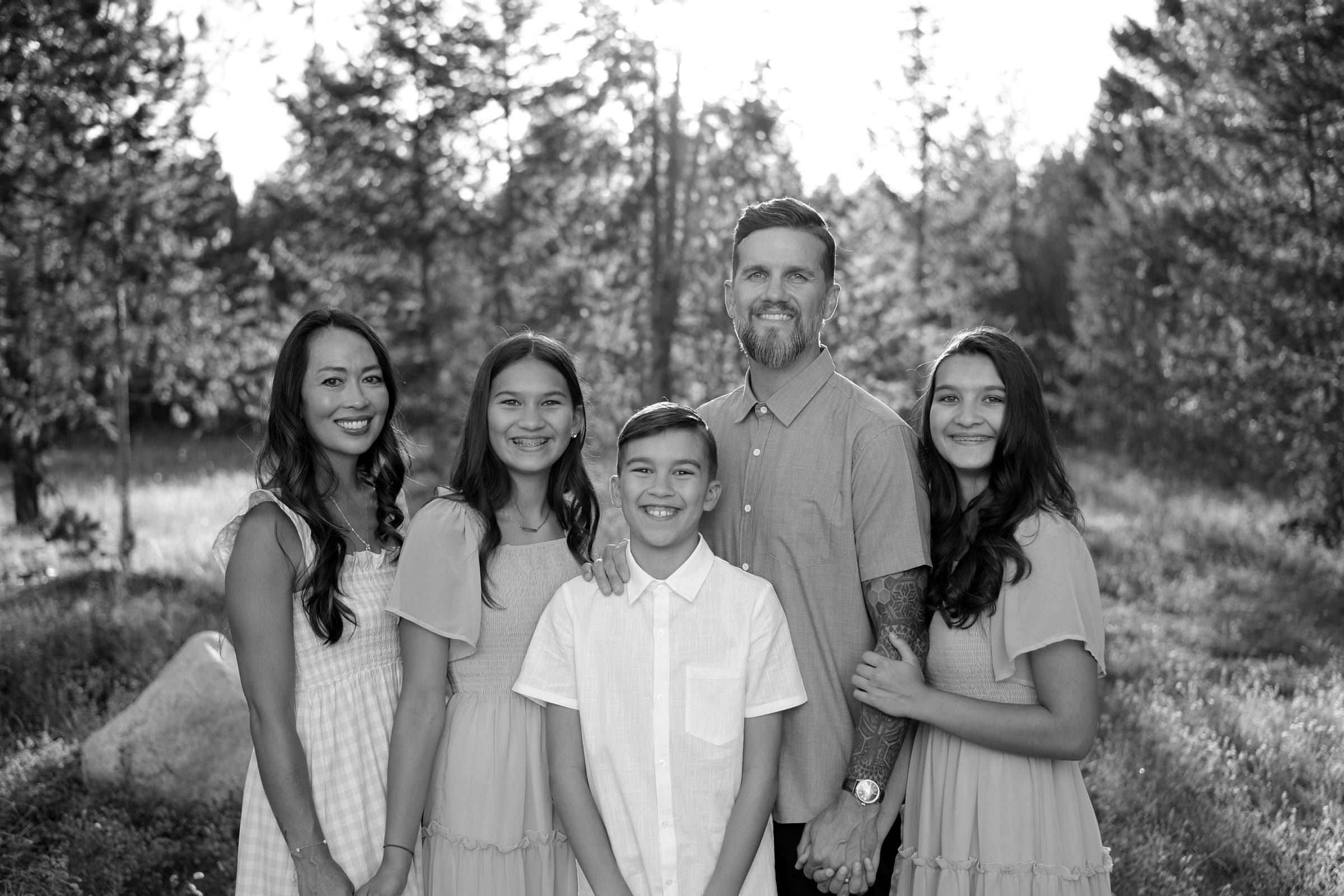 Adam Weisner with his wife, Jen, and their three children