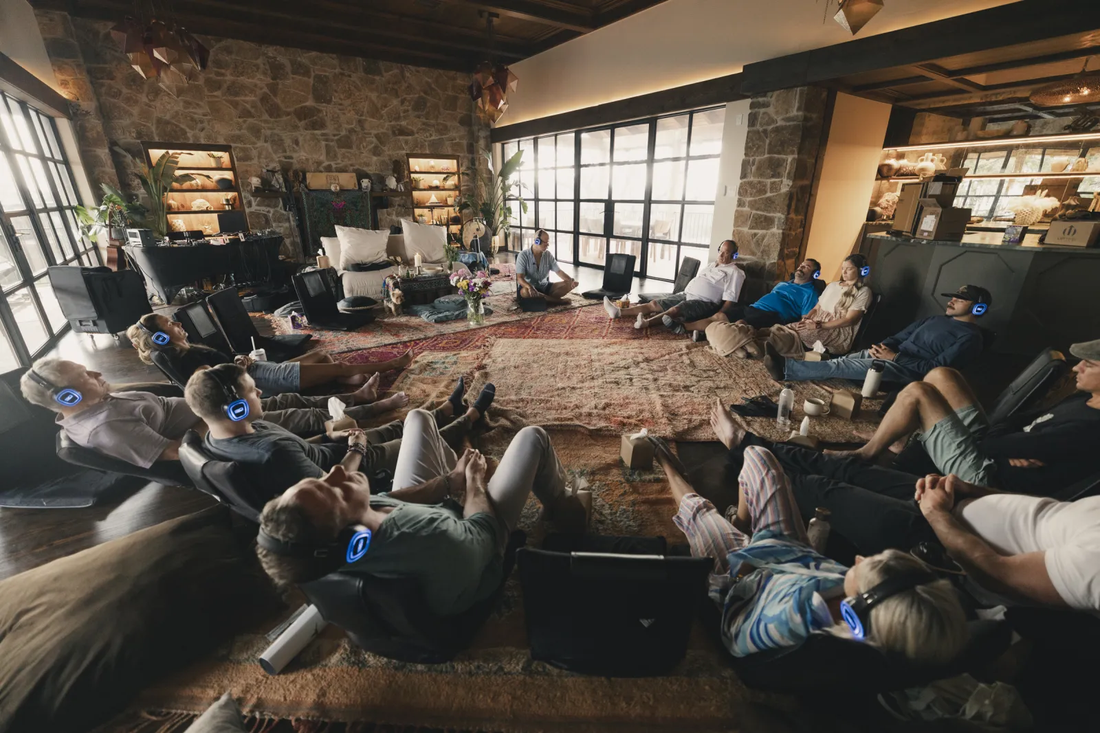 Participants resting with headphones during ceremony in the main hall of our Texas sanctuary