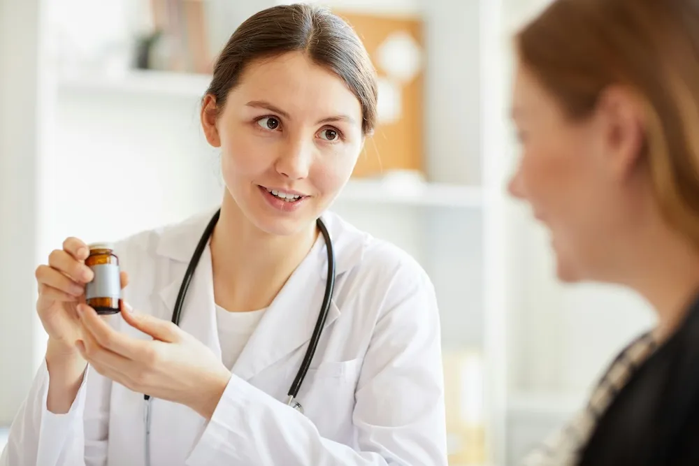 An image of a medical provider prescribing the best health program to a Clume Health customer.