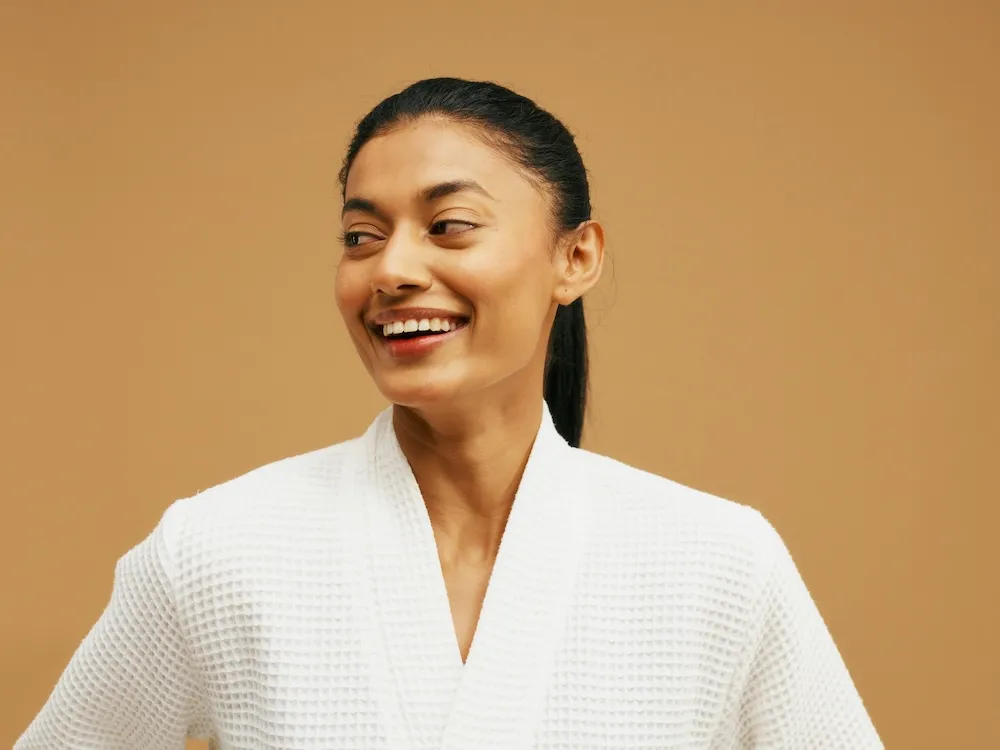 An image of a woman smiling.