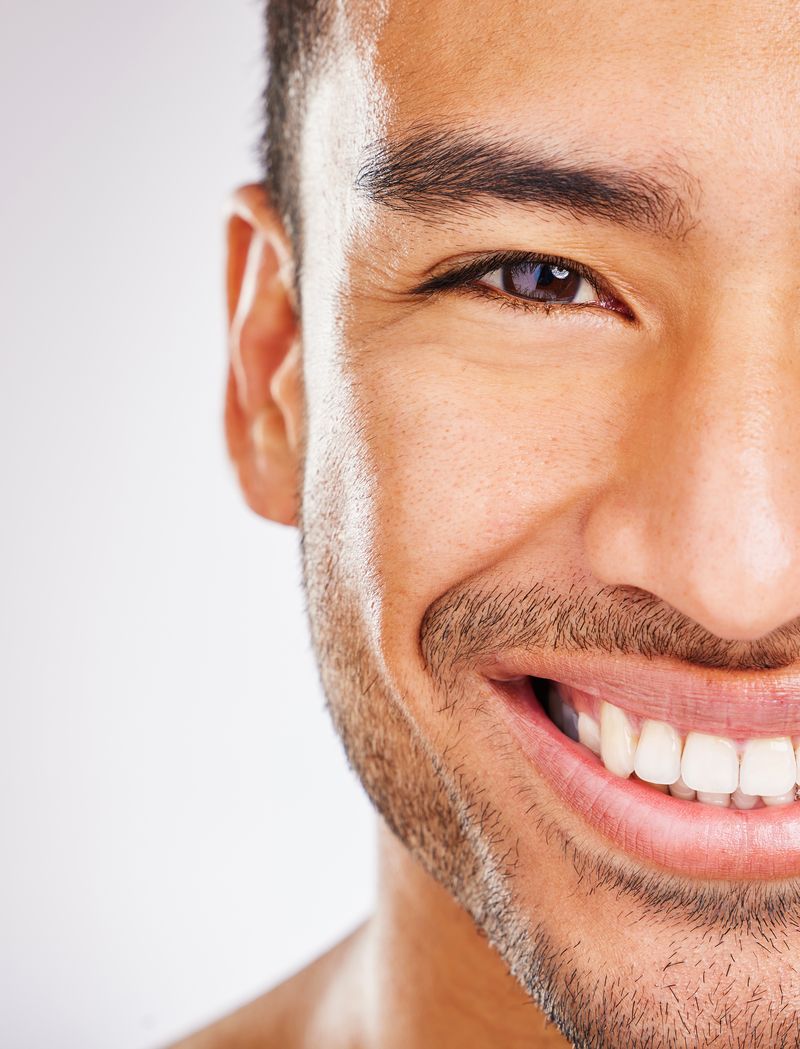 An image of a man smiling.