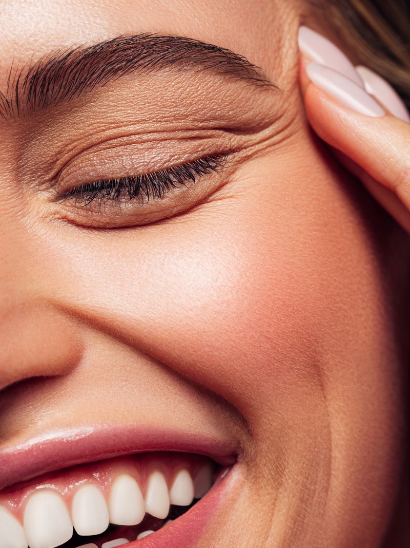 An image of a women smiling.