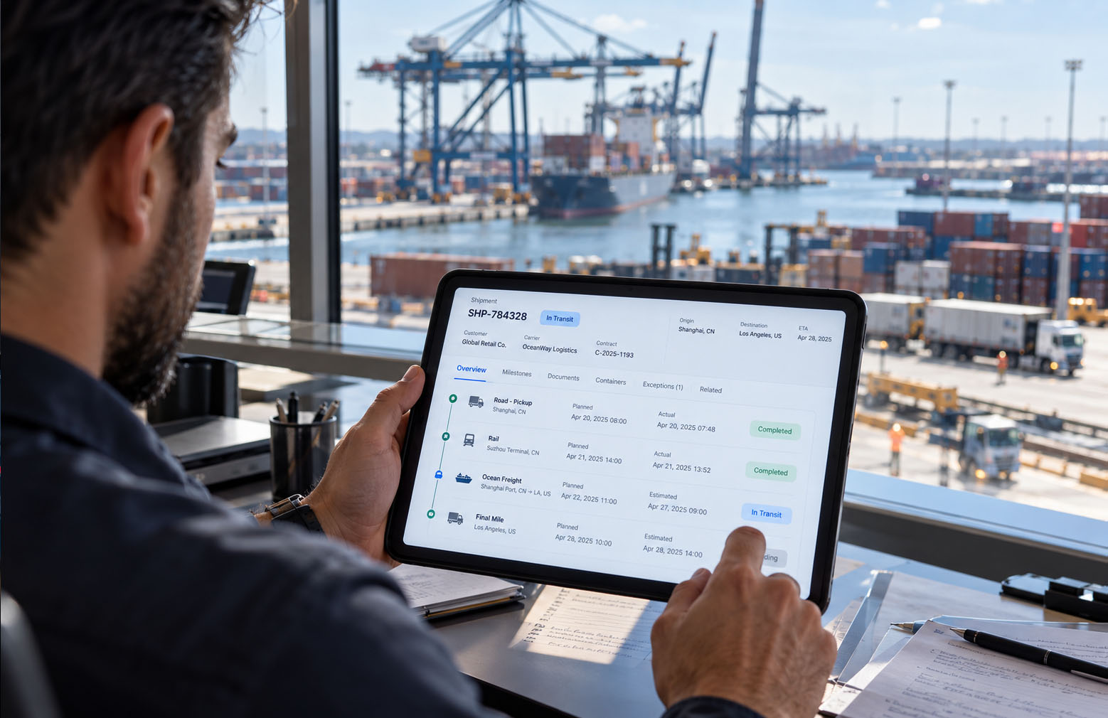 Logistics operator tracking road, rail, and ocean shipment milestones on a tablet overlooking a container port.
