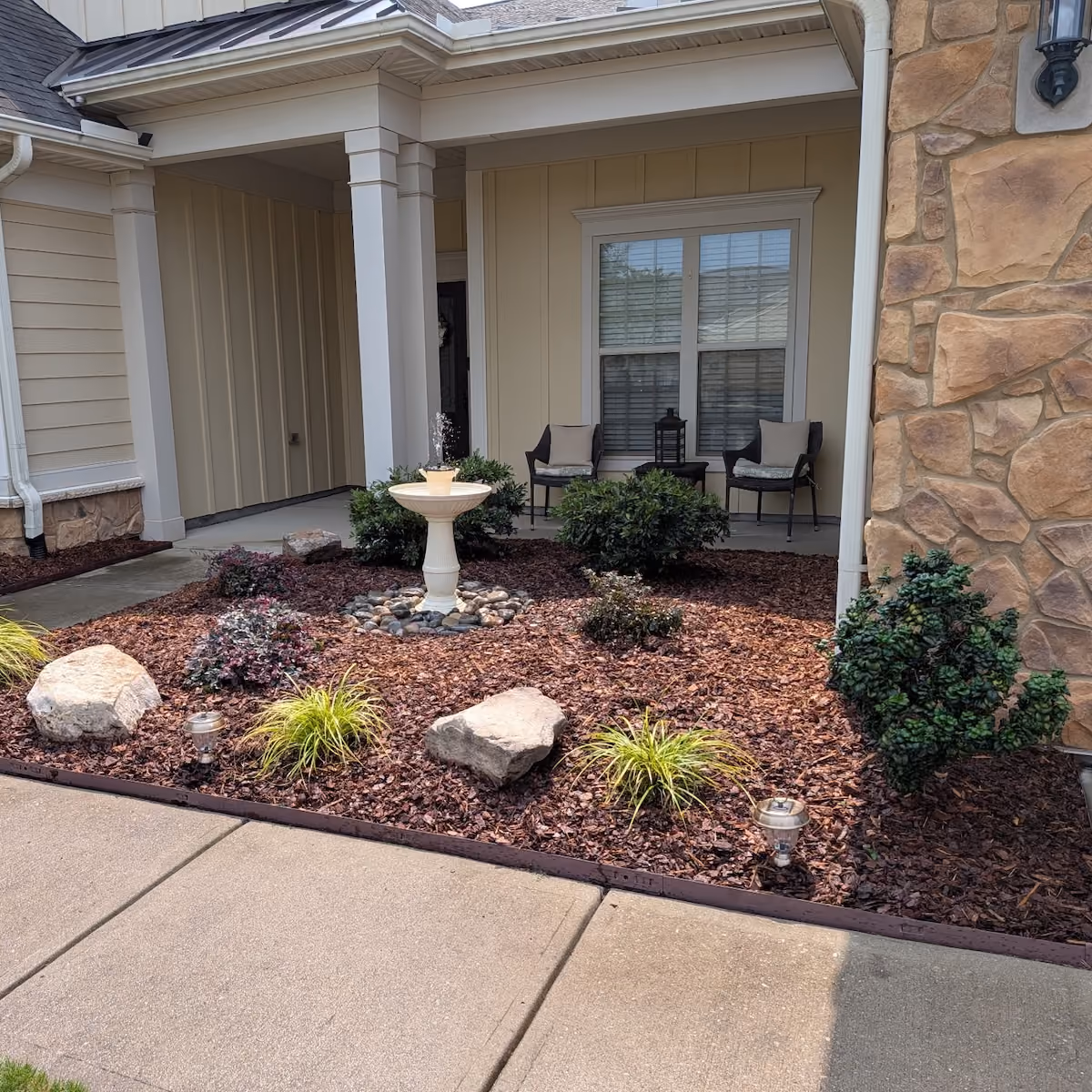 Professionally designed landscape beds enhancing residential curb appeal