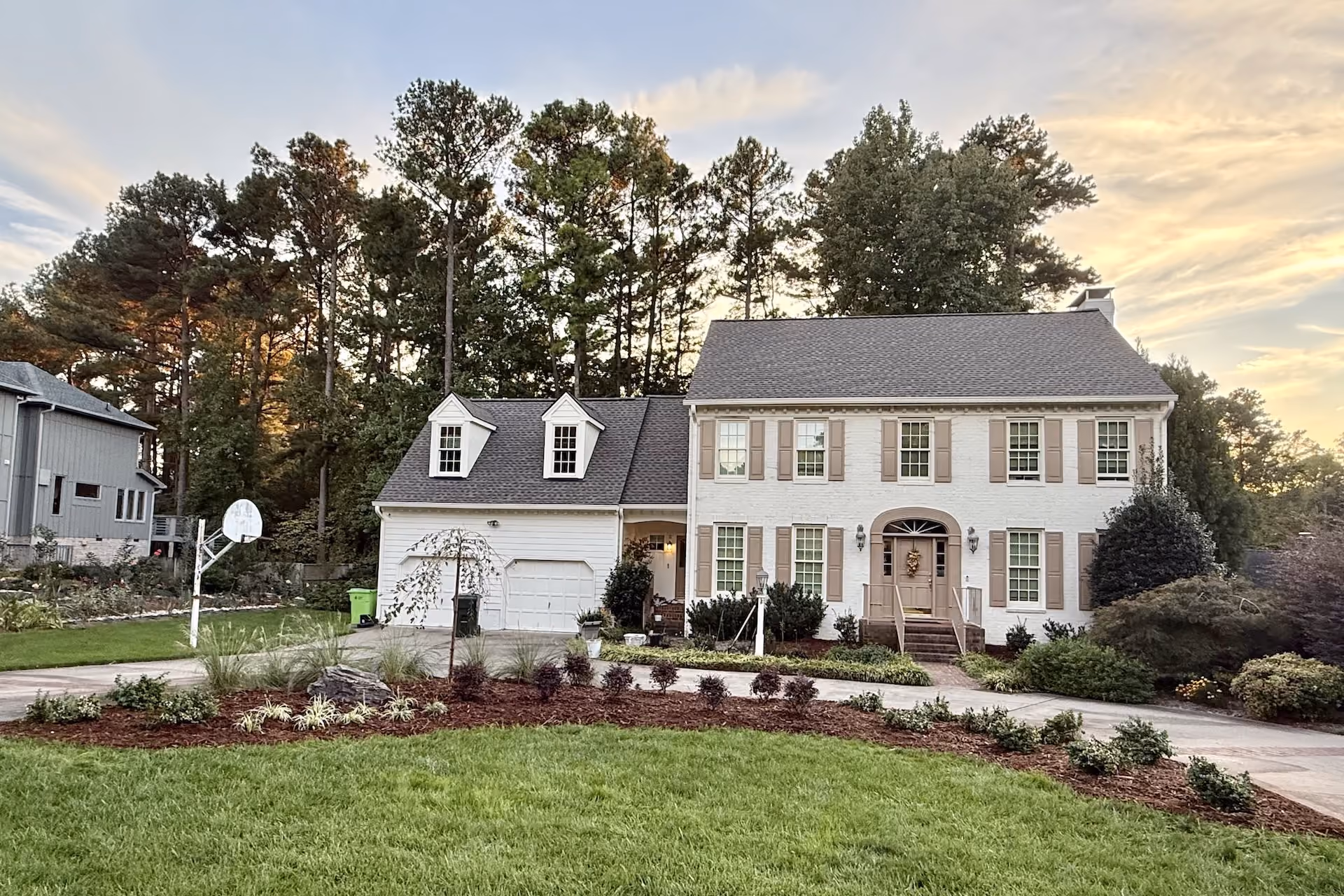 Landscape installation near me with plants, mulch, and decorative stone
