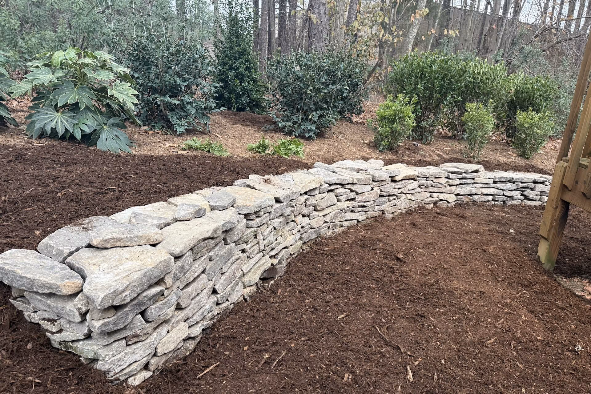 Professional retaining wall installation by Modern Plant Creations