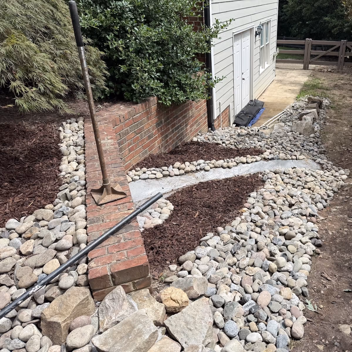 Custom yard drainage system protecting residential landscaping
