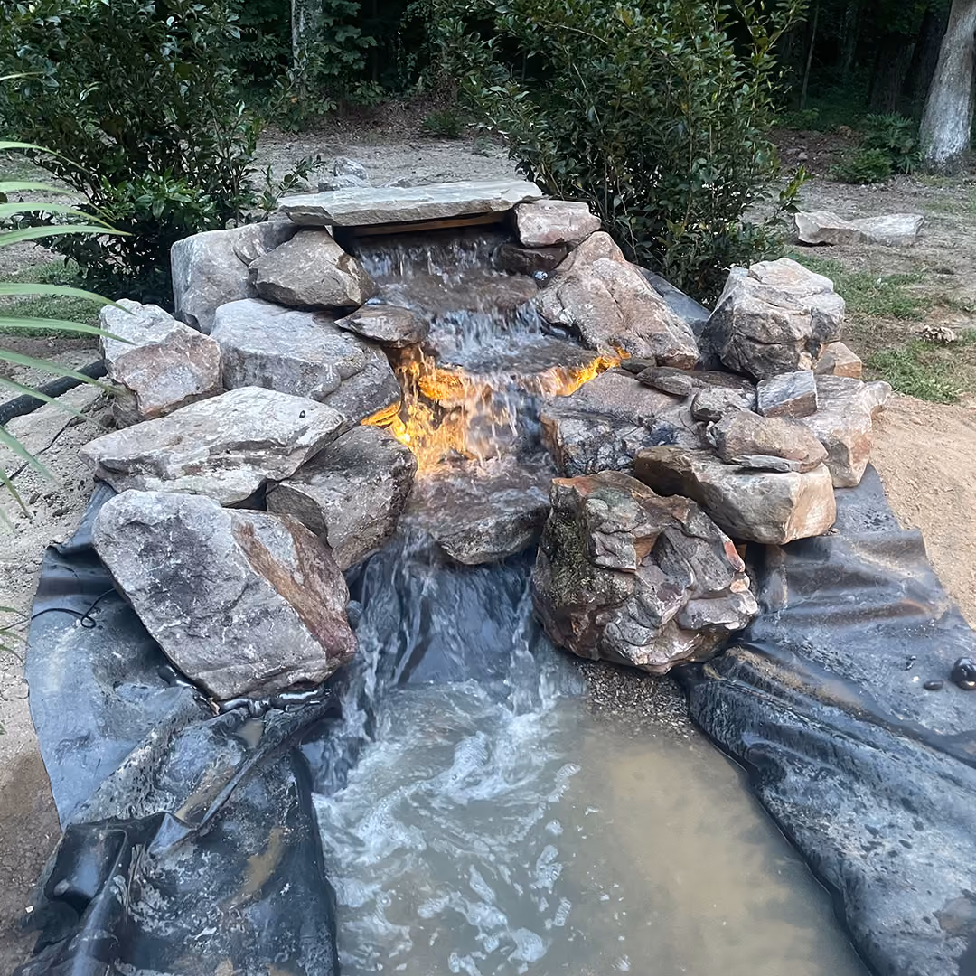 Modern Plant Creations natural stone pondless waterfall