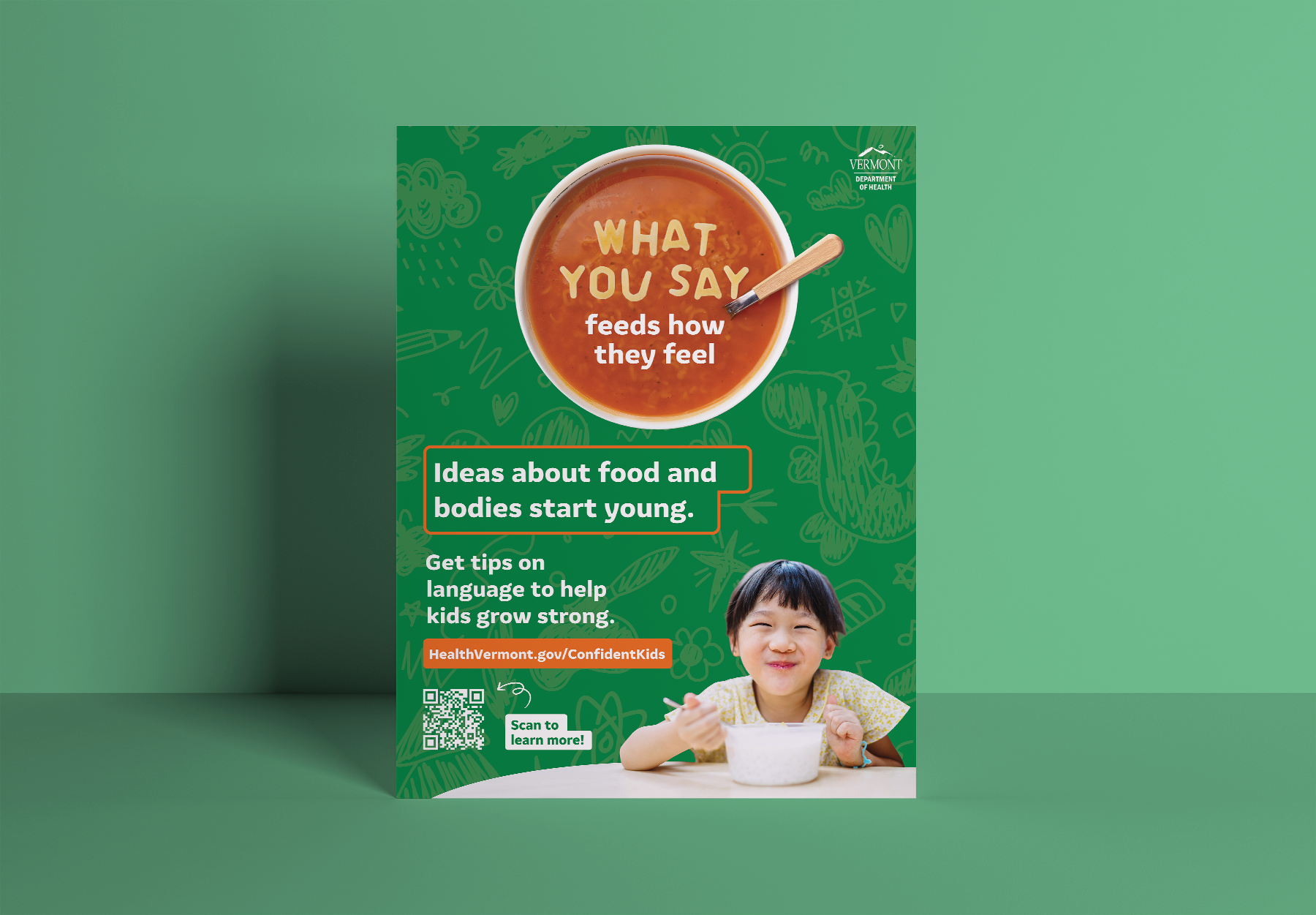 Poster reading What you say feeds how they feel, with a young child eating at a table