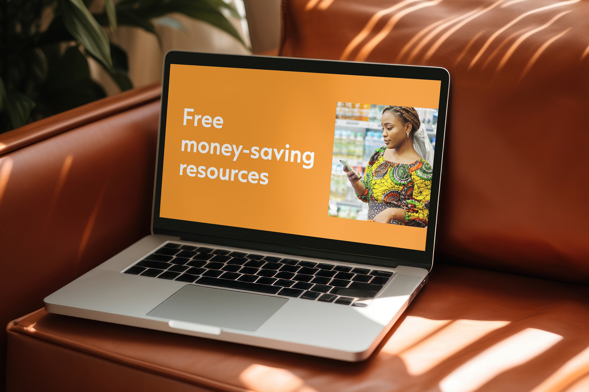 Laptop showing a SNAP-Ed video titled Free money-saving resources
