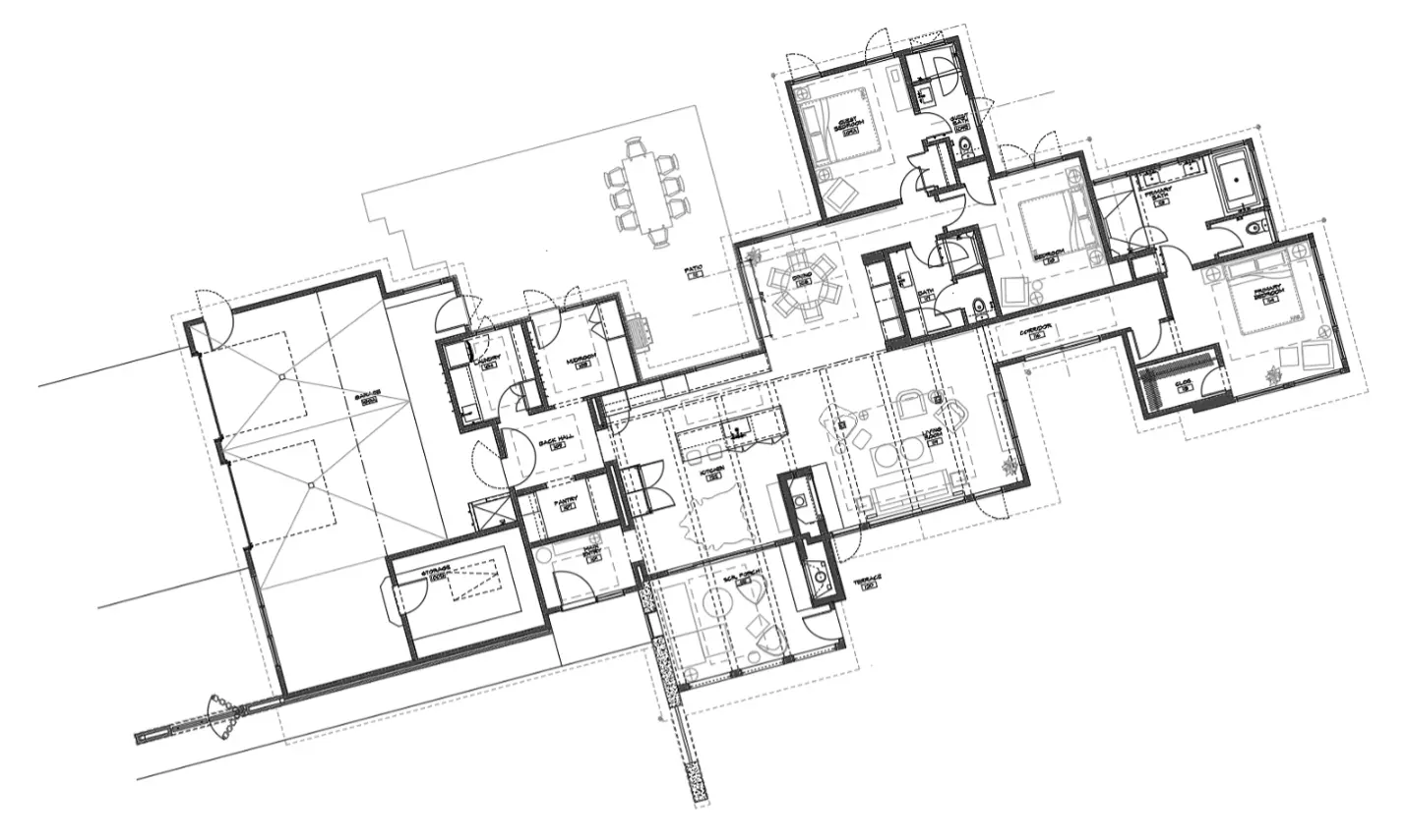 Architectural floor plan of a single-story house with rooms, bathrooms, garage, and outdoor patio.