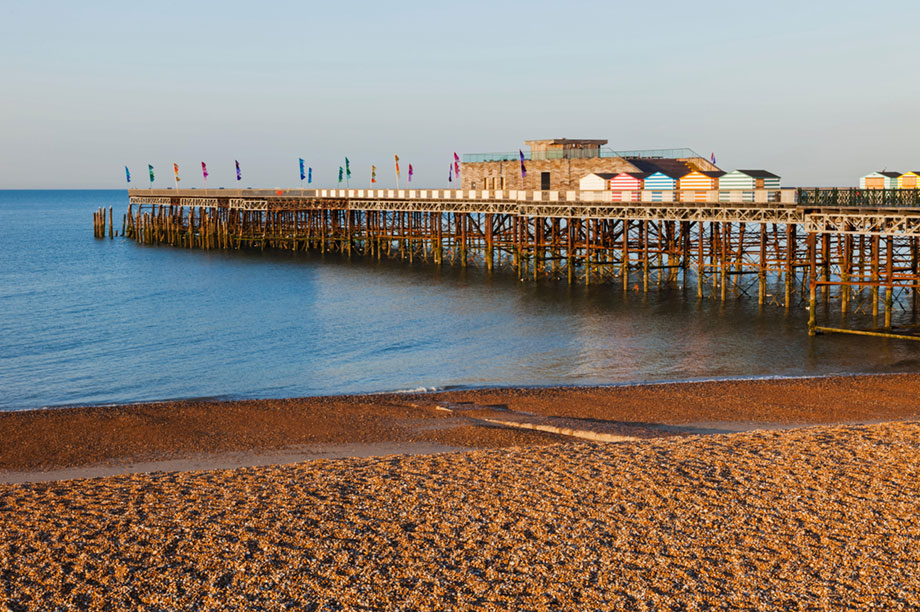 Hastings Pier and colourful beach huts