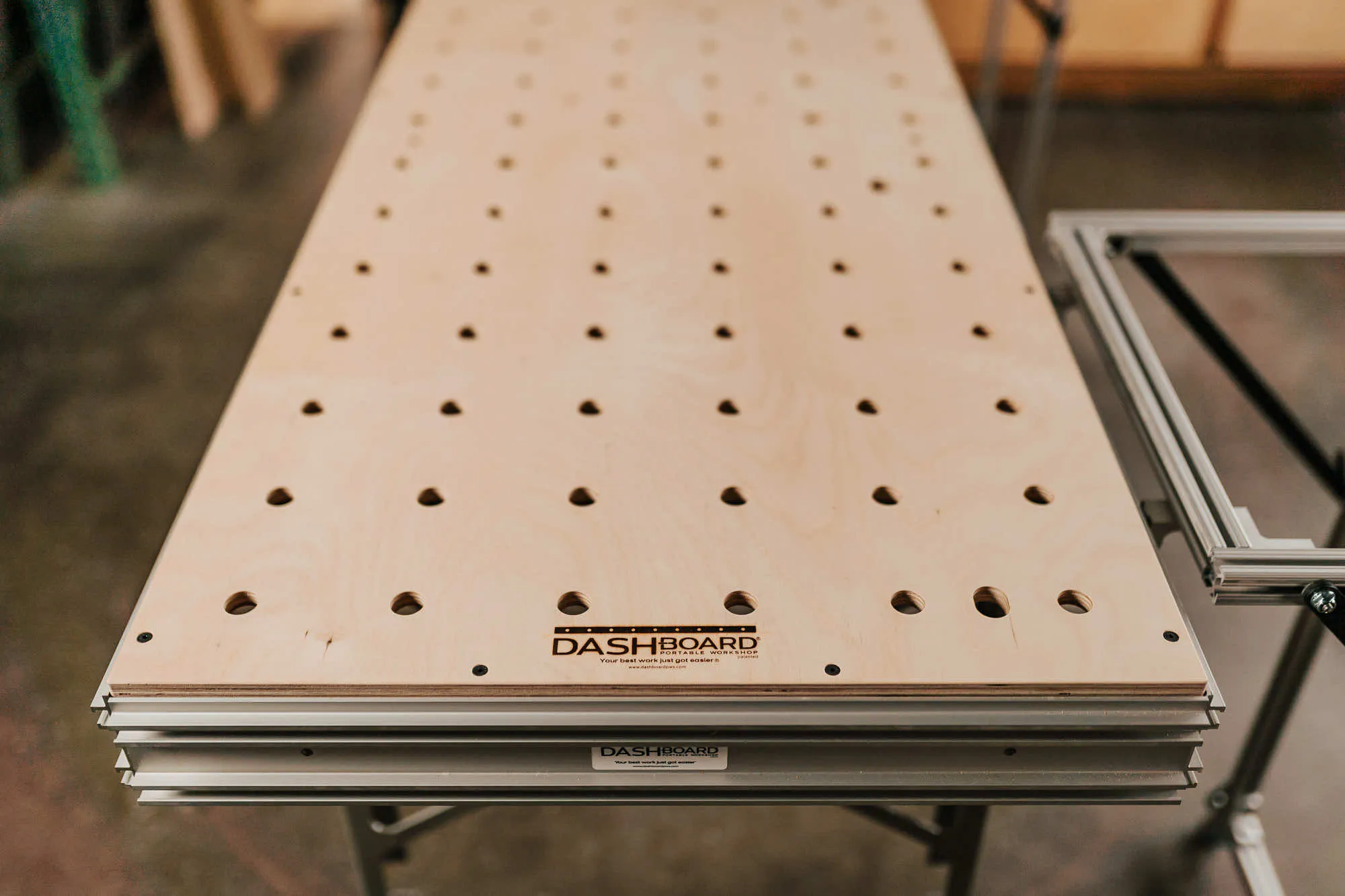 Top angle shot of a workbench with holes in it