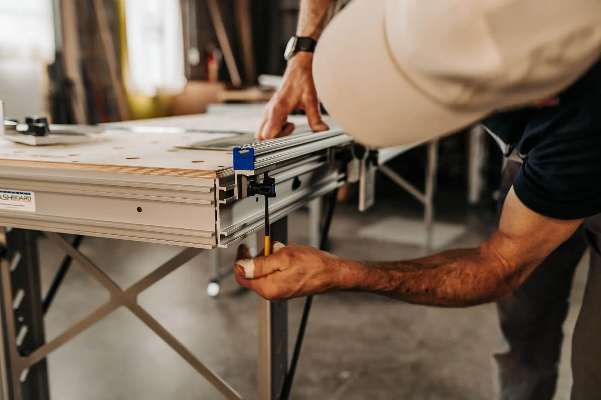 A man using a crosscut fence for precision 