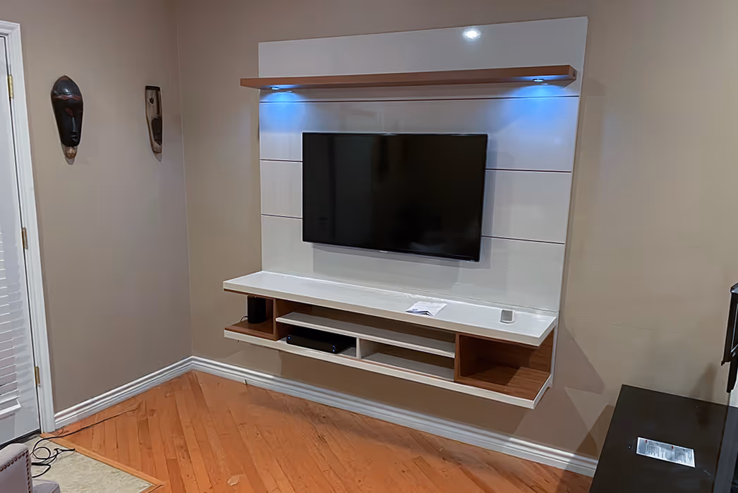 Full-motion TV mount installed by A-Breasy