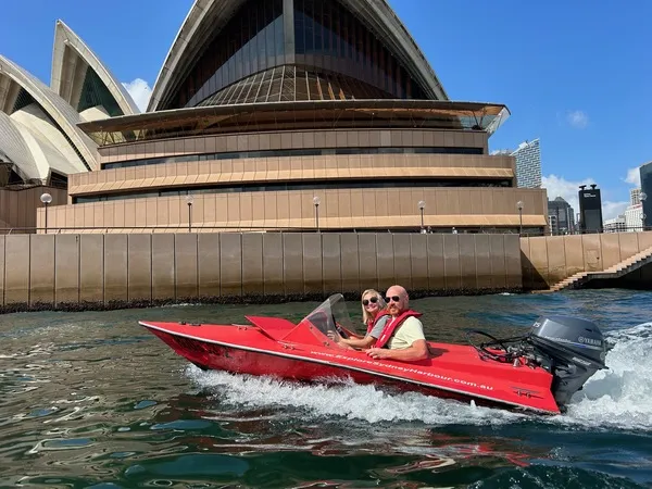 Speedboat flying past Sydney Opera House — Grand Tour gift