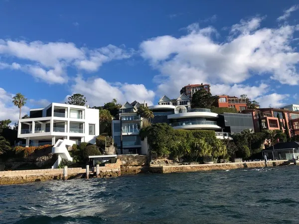 Speedboat past Point Piper luxury mansions — the perfect Sydney experience gift