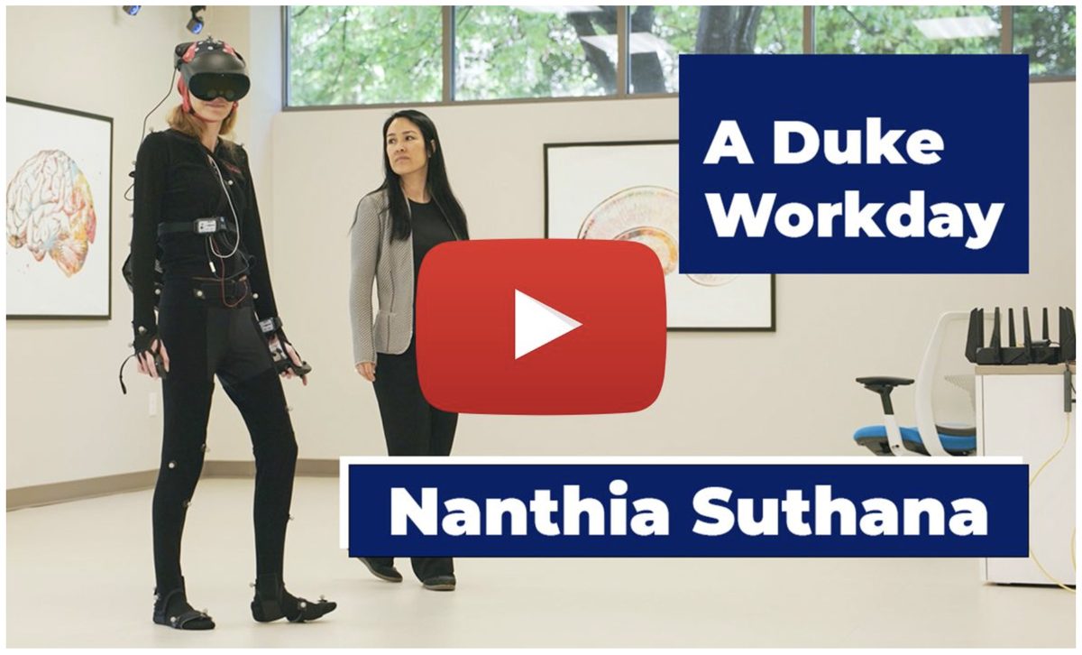 Nanthia Suthana with a study participant wearing a motion-capture suit and VR headset in the lab